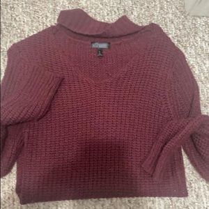 2 boutique sweaters. One size small and the brown size large but fits like small